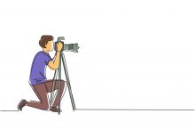 Single continuous line drawing professional photographer man kneeling for taking pictures with digital camera and tripod. Digital photography hobby. One line draw graphic design vector illustration